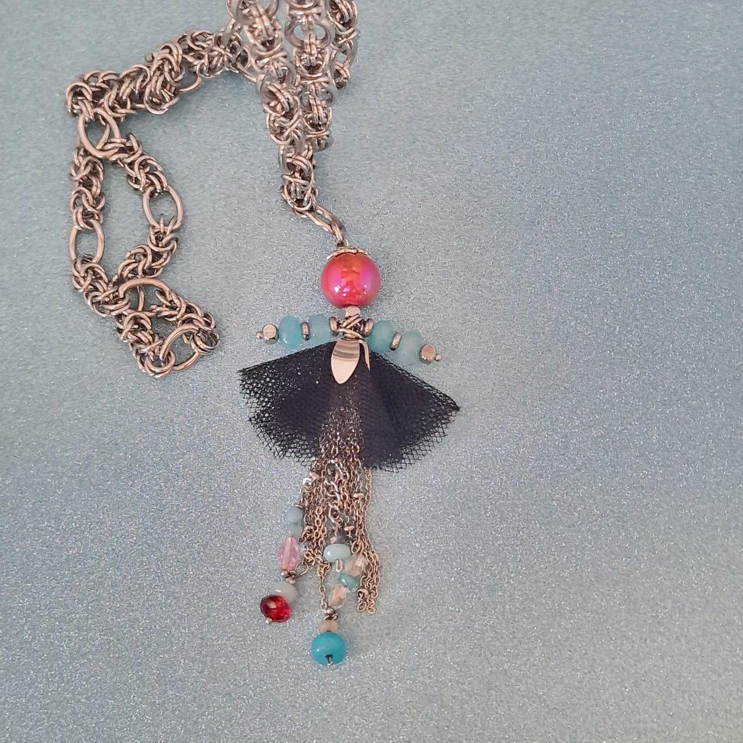 collana con bambolina