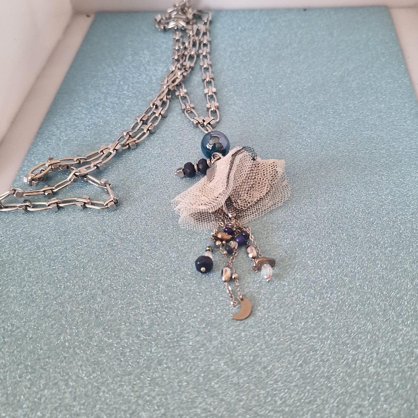 collana con bambolina