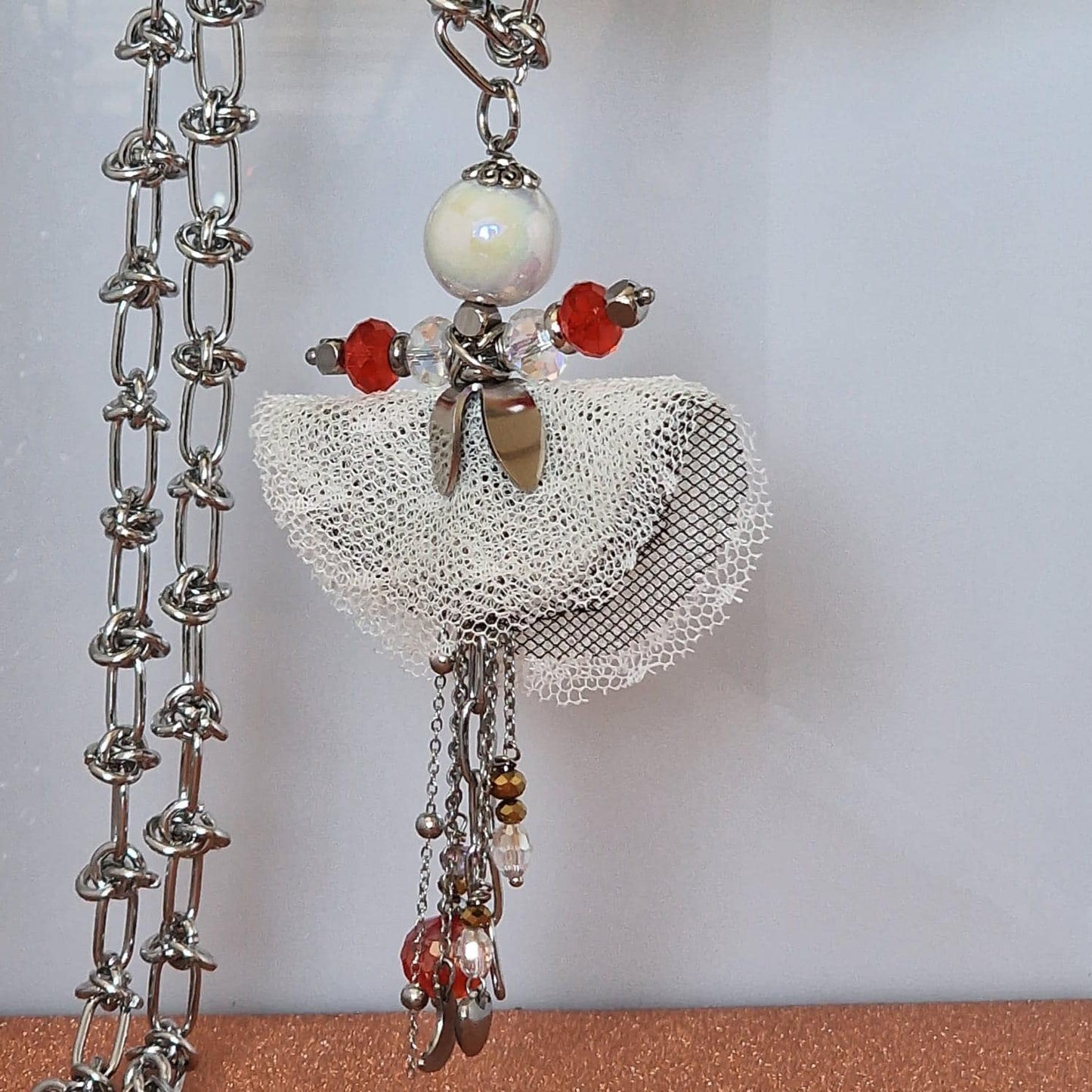 collana con bambolina