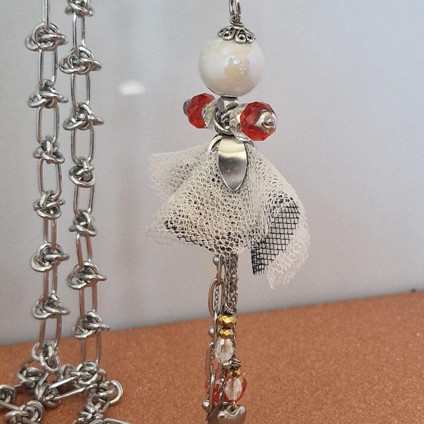 collana con bambolina