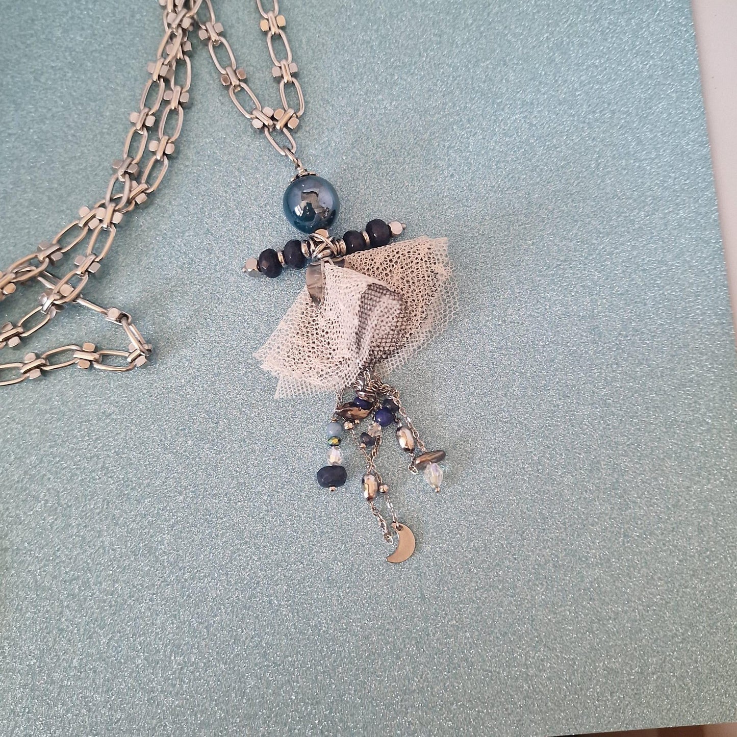 collana con bambolina