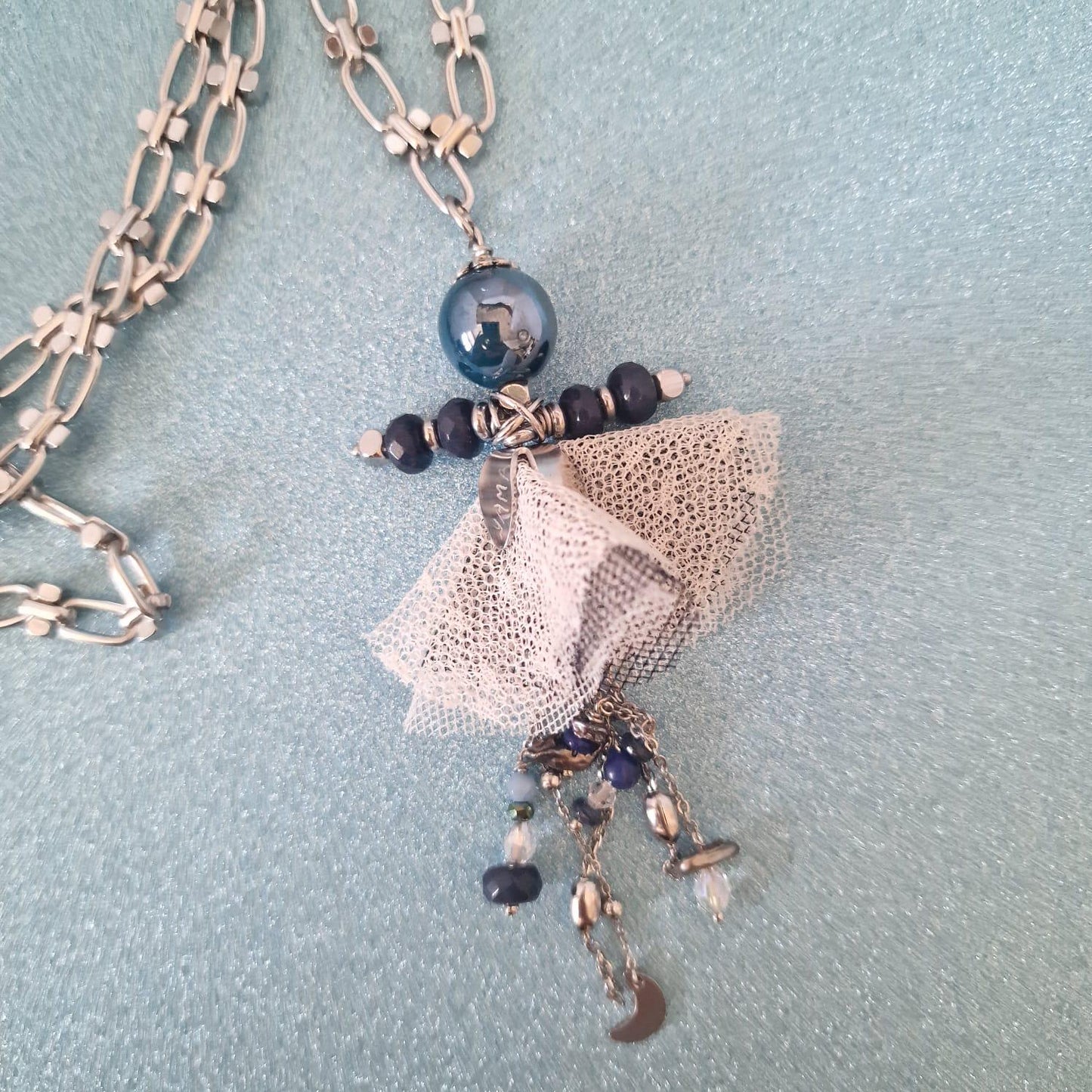 collana con bambolina