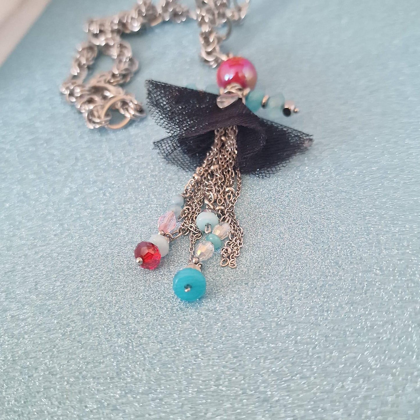 collana con bambolina