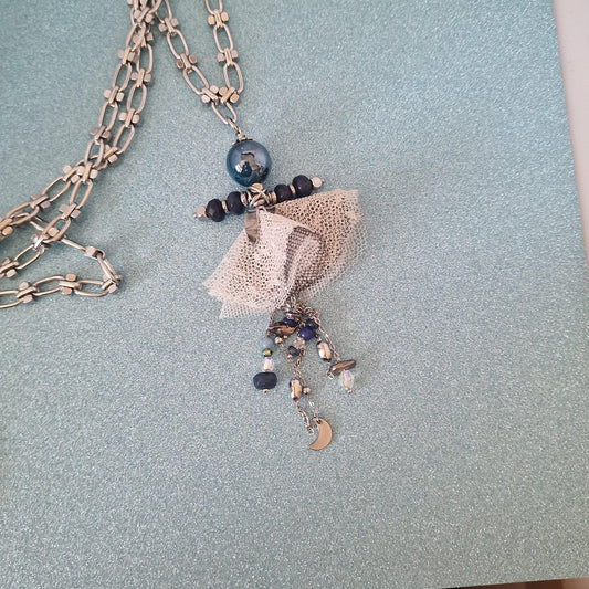 collana con bambolina